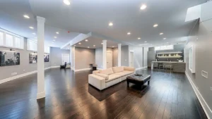 Finished basement remodeling in Maryland with modern lighting and durable flooring